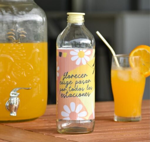 Botella de vidrio florecer